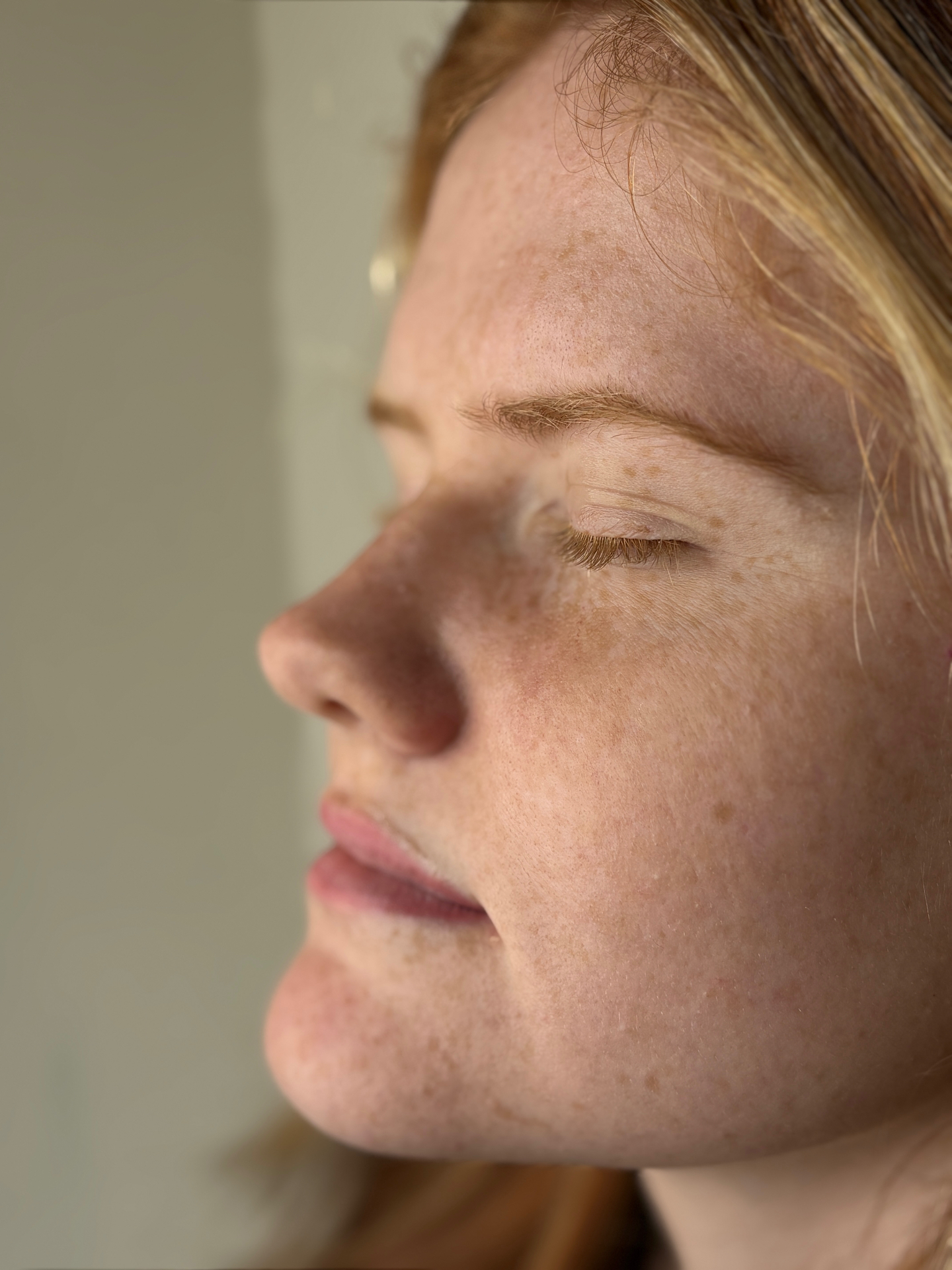 Client lip blush result — opposite profile